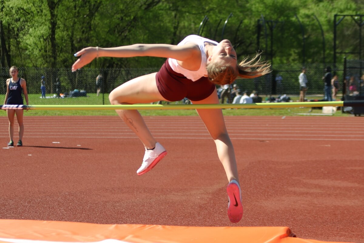 Photo of Hailee Hardman '27 competing in the high jump