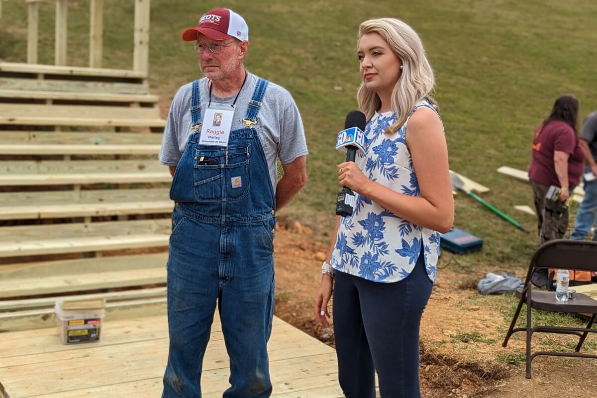 Photo of Reggie Dailey and a reporter with the WBIR-TV news network