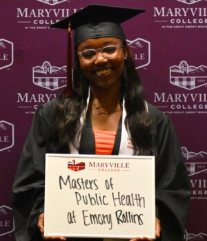 Photo of Amiana Grady '24 smiling at the camera