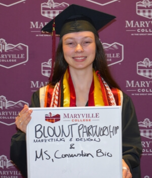 Photo of Emily Huffstetler '24 smiling at the camera