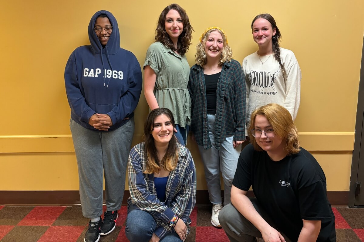 Photo of new members of Alpha Psi Omega