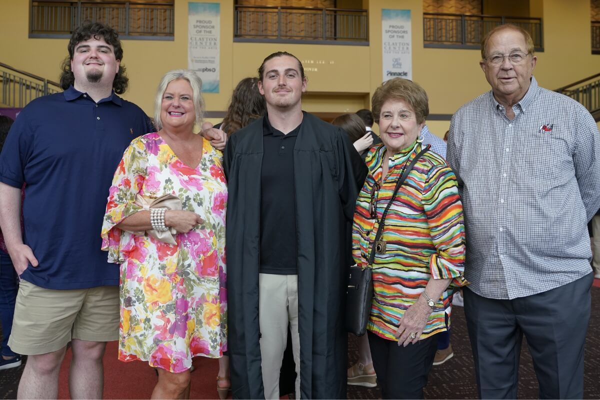 Photo of a senior with family