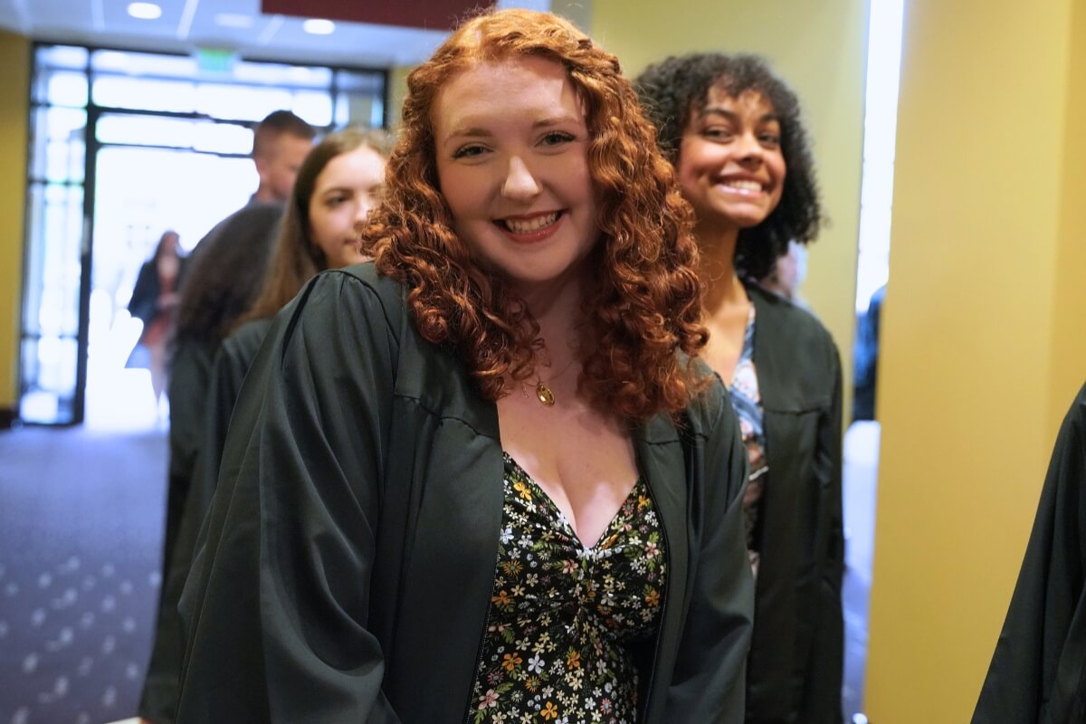 Photo of Lauren Gaines smiling at the camera