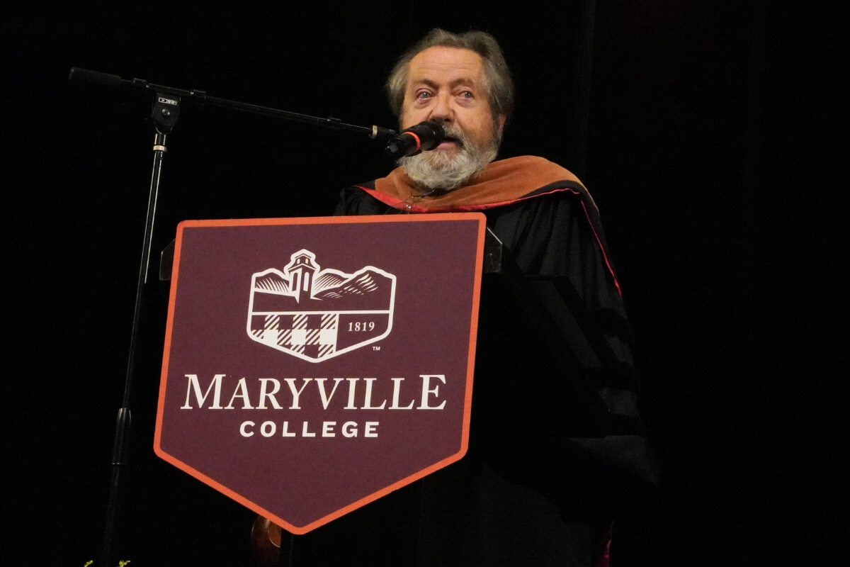 Photo of Dr. Carl Gombert delivering the Baccalaureate address.