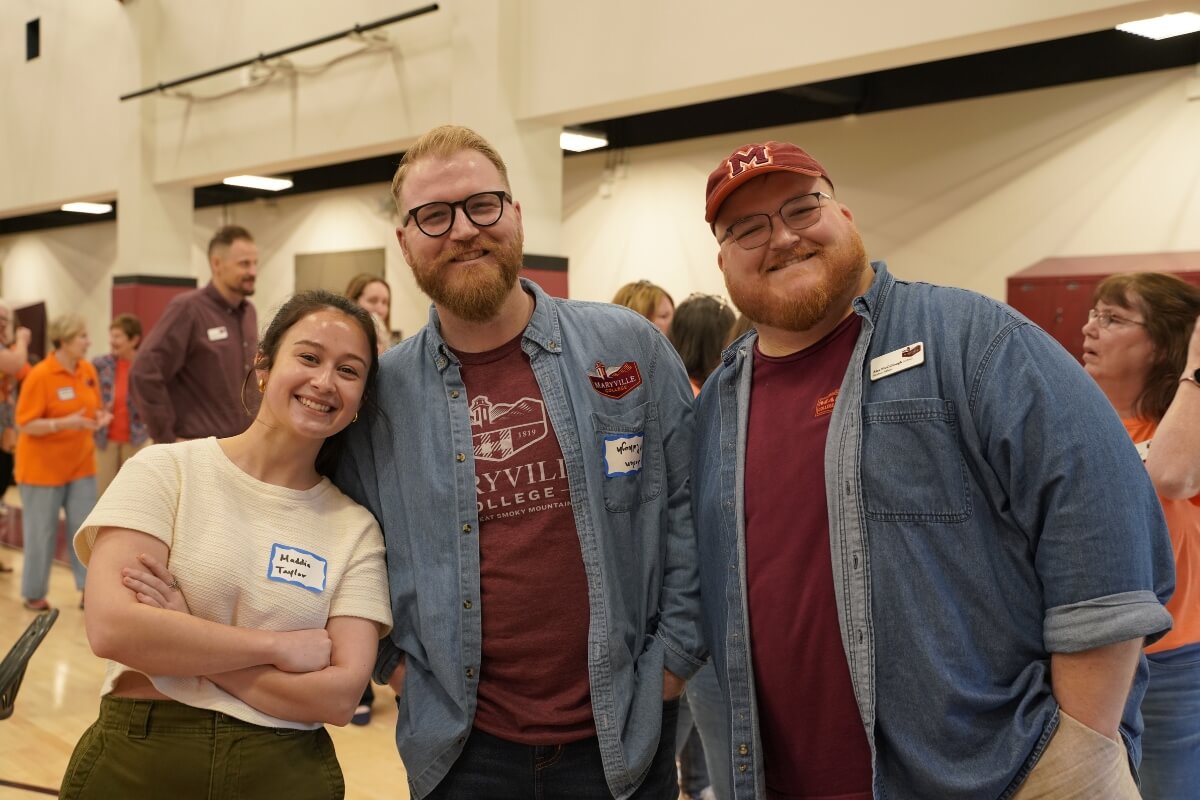 Photo of Maddie Taylor and the McCullough brothers