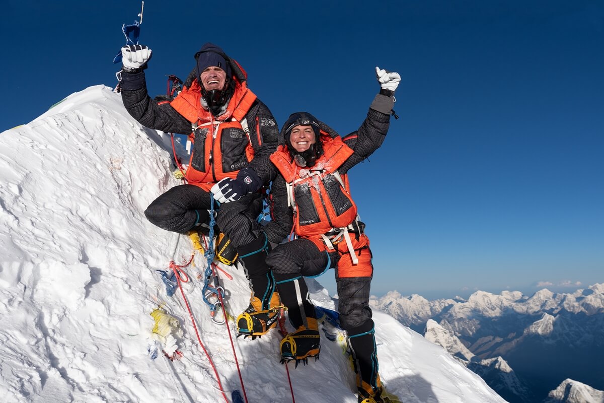 Photo of Scott Lehmann and Shayna Unger atop a mountain peak