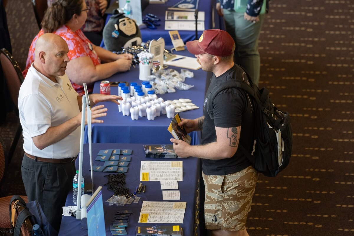 Photo of an ETSU representative at last week's Maryville College Graduate School Fair