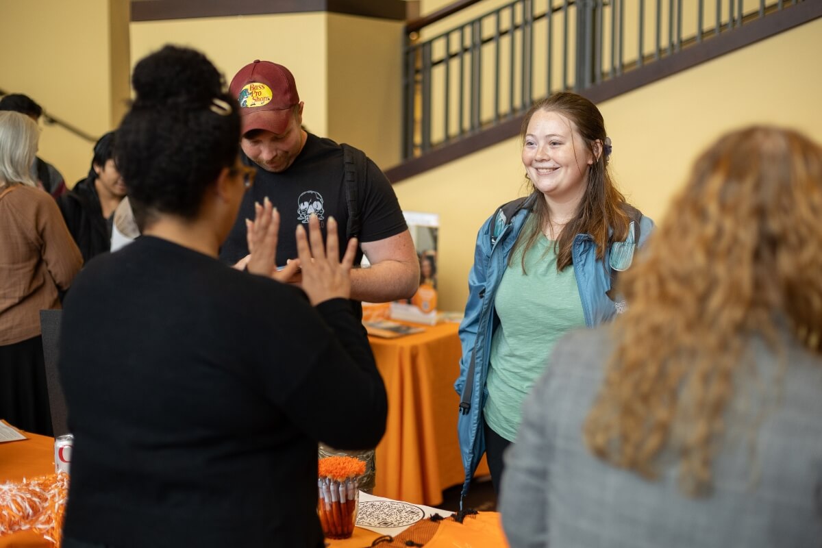 Photo of smiling student at Maryville College Graduate School Fair