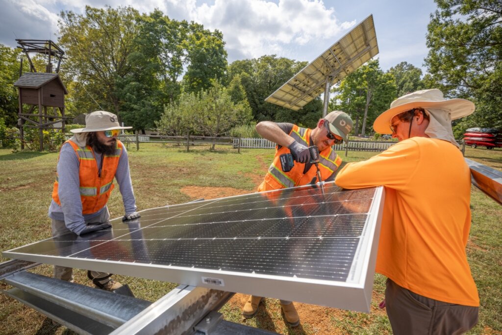 Photo of installation of the new Mountain Challenge solar array on the MC campus
