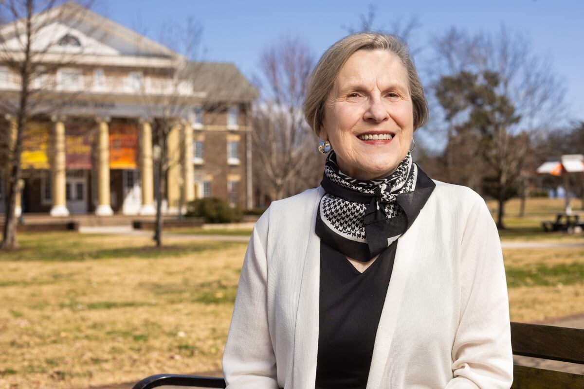 Photo of Kathleen Farnham in front of Pearsons Hall