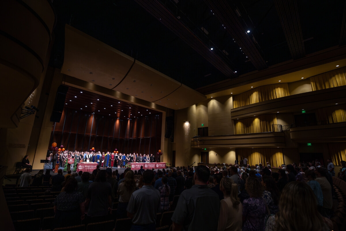 Photo of a dimly lit Nutt Theatre in the Clayton Center for the Arts