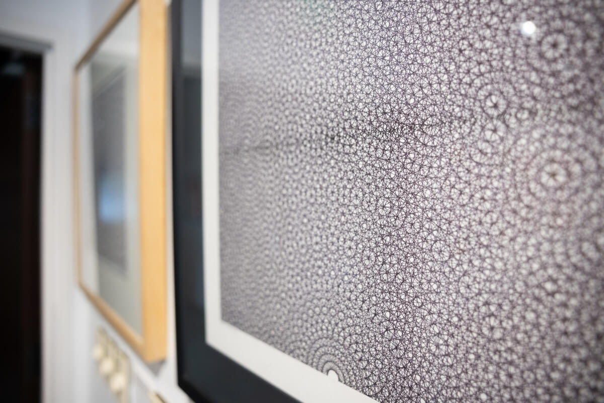 Photo of works of art by Dr. Carl Gombert in the art galleries of the Clayton Center for the Arts.