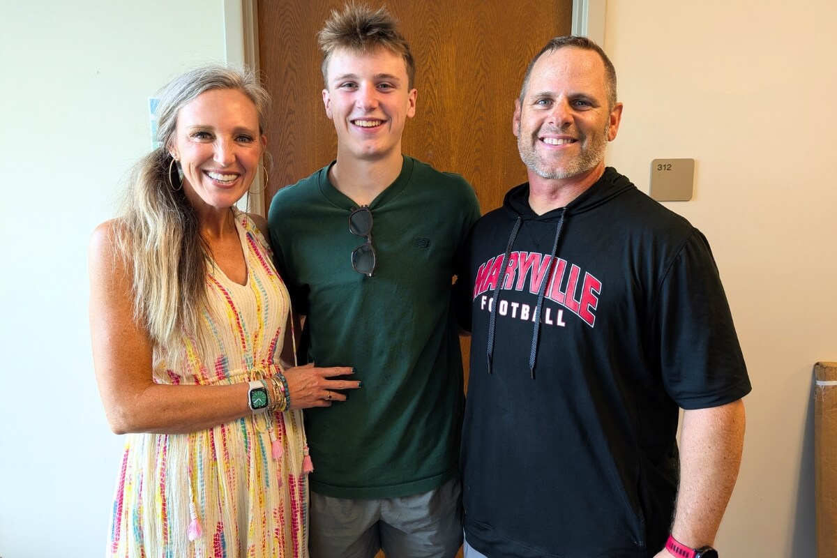 Photo of one of the new Maryville College legacy students, Casey Cobble, and his parents