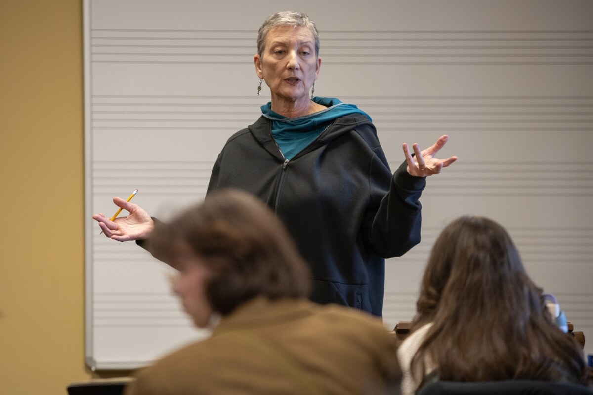 Photo of Dr. Alicia Massie-Legg lecturing in a class before her retirement in May