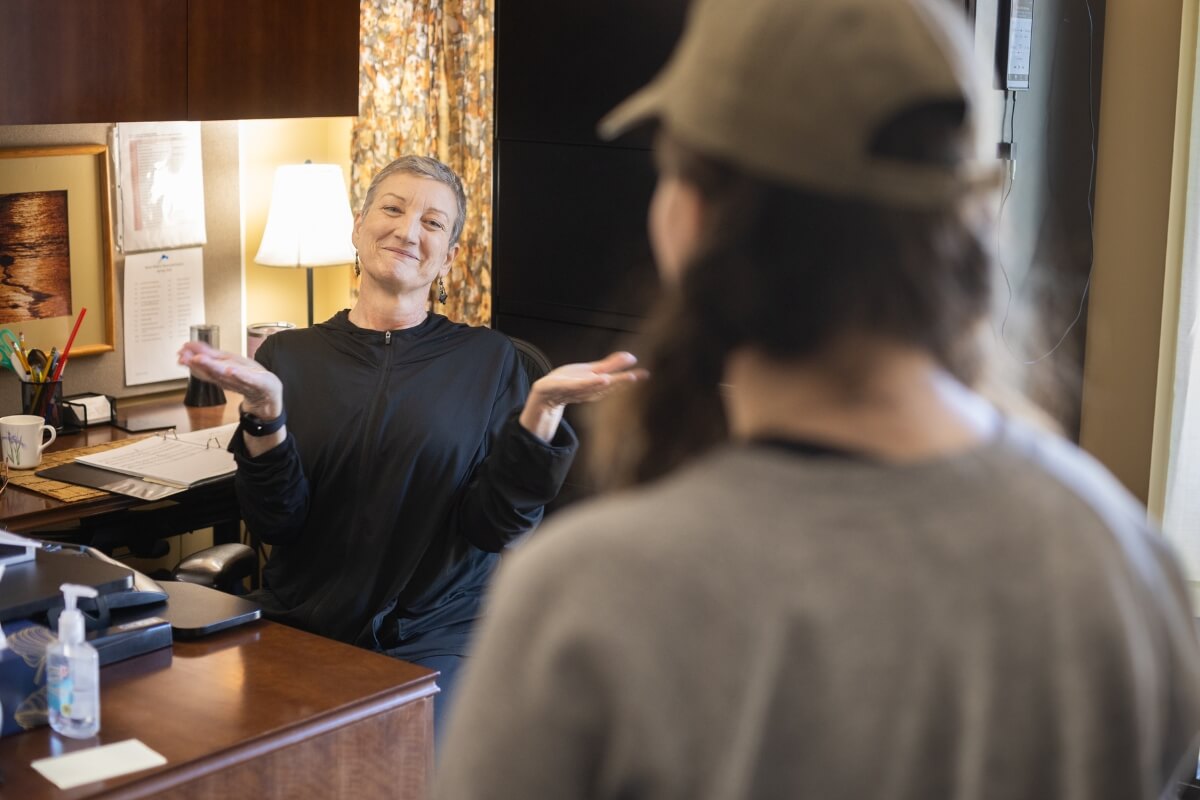 Photo of Alicia Massie-Legg making a victorious gesture