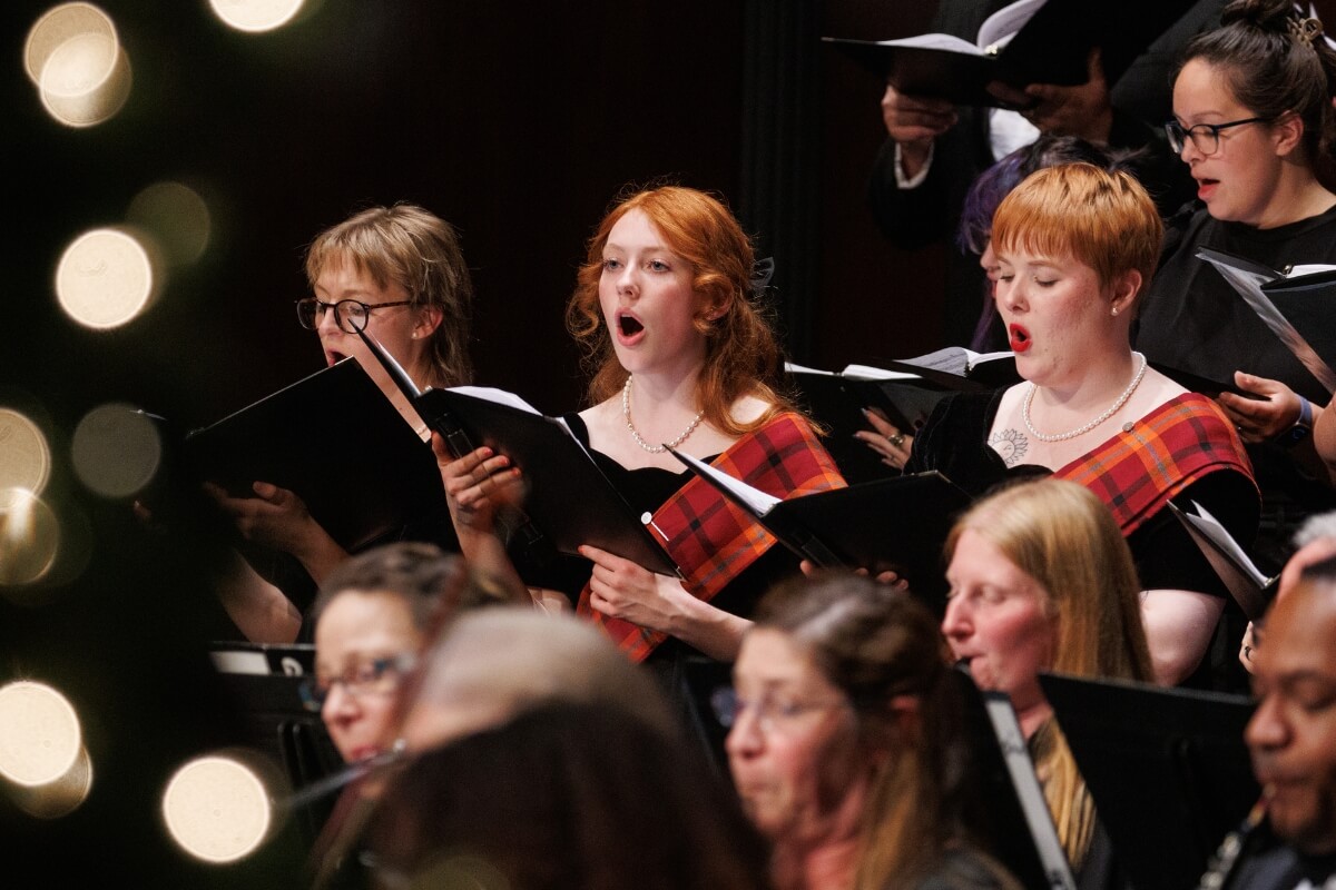 Photo of Maryville College Concert Choir members singing together, as they will on the upcoming choir tour
