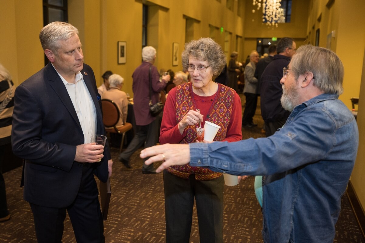 Photo of Dr. Bryan Coker and guests at MC presidential portrait unveiling ceremony