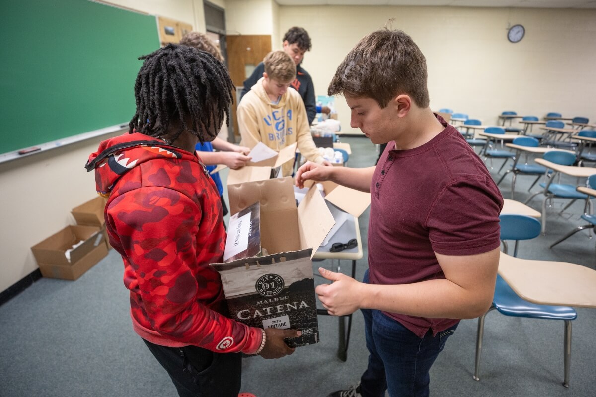 Photo of two Maryville College students taking part in community engagement projects.