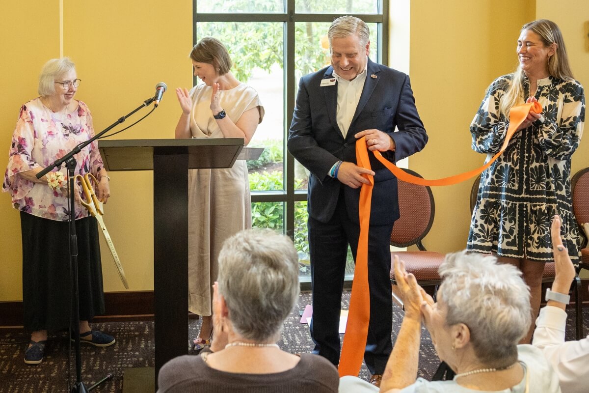 Photo of the official ribbon cutting of the Doug and Sally Gross Memorial Garden during the Clayton Center's 15th anniversary gala