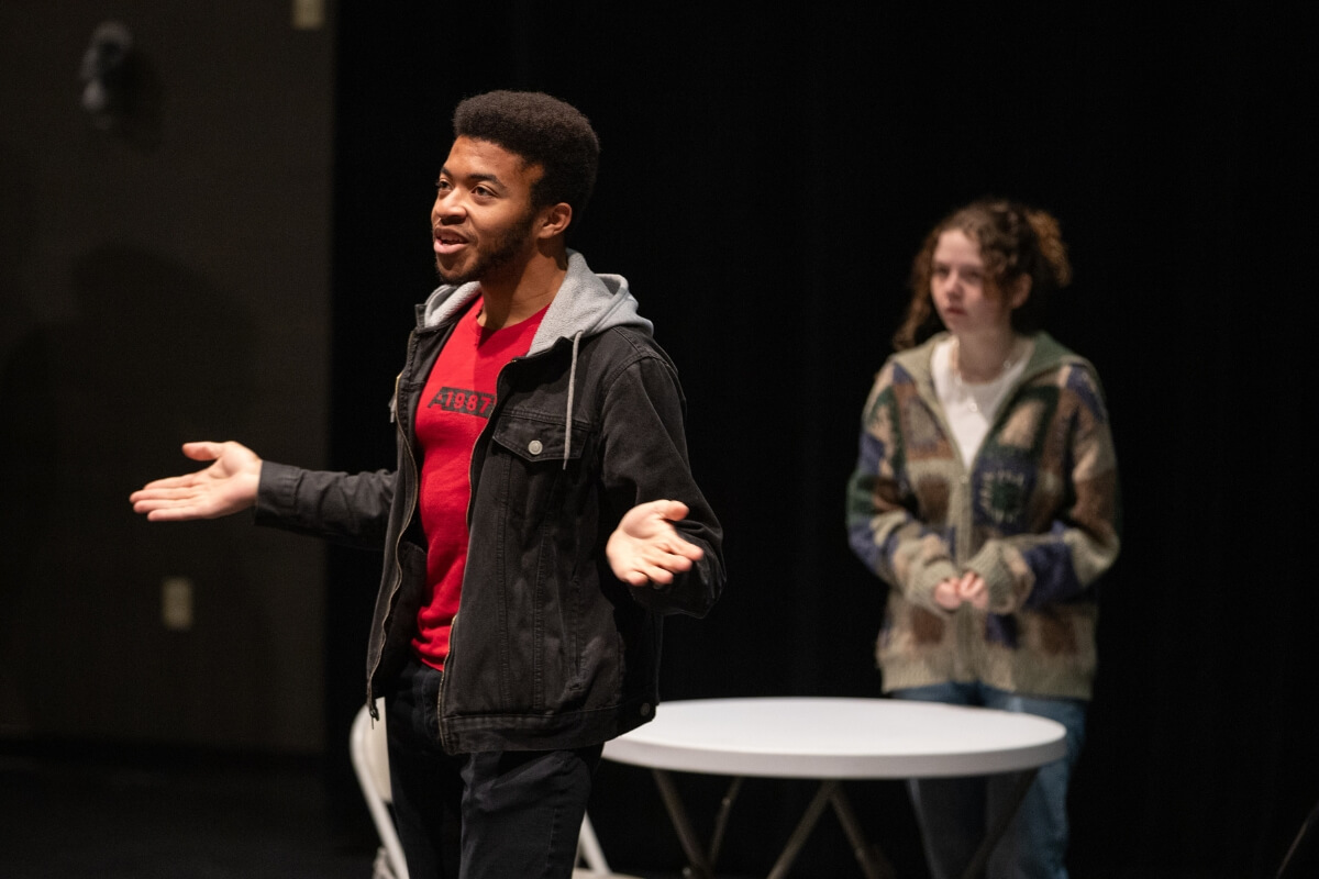 Photo of two University of Tennessee guest actors rehearsing "Angels in America"