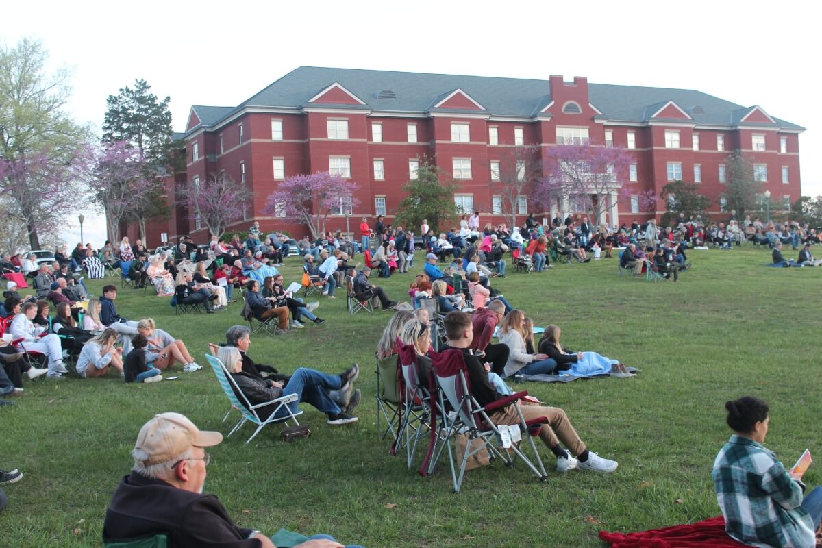 Photo of crowd sitting on the hillside of Lloyd Beach at the 2024 Maryville College Easter Sunrise Service