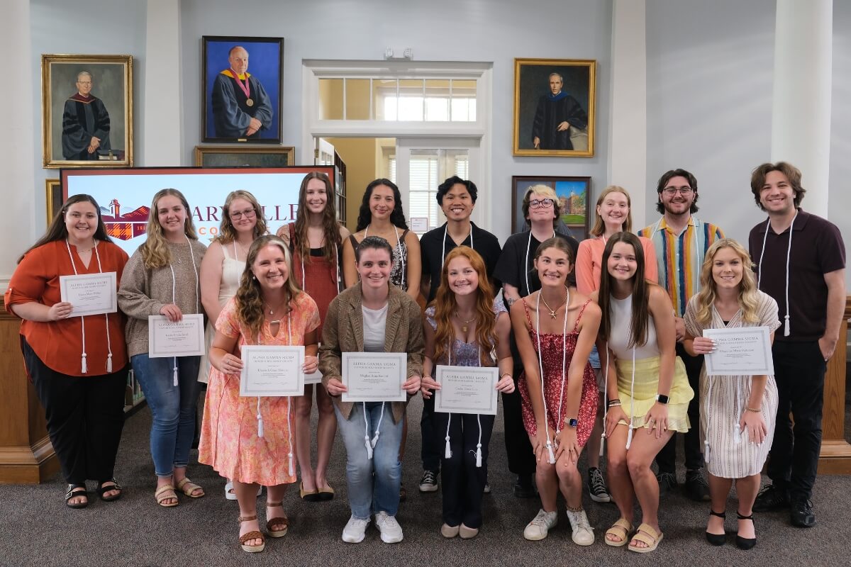 Photo of one of the seven Maryville College honor societies, Alpha Gamma Sigma, and its new members for 2024-25