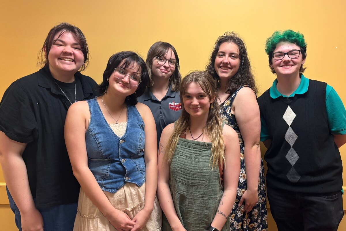 Photo of newly inducted members of Alpha Psi Omega, the theatrical honor society at Maryville College.