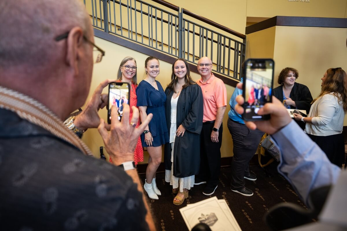 Photo of a group of people having their picture taken after Maryville College Baccalaureate 2025