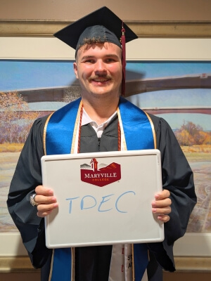 Photo of impressive Maryville College graduate Eli Preswood