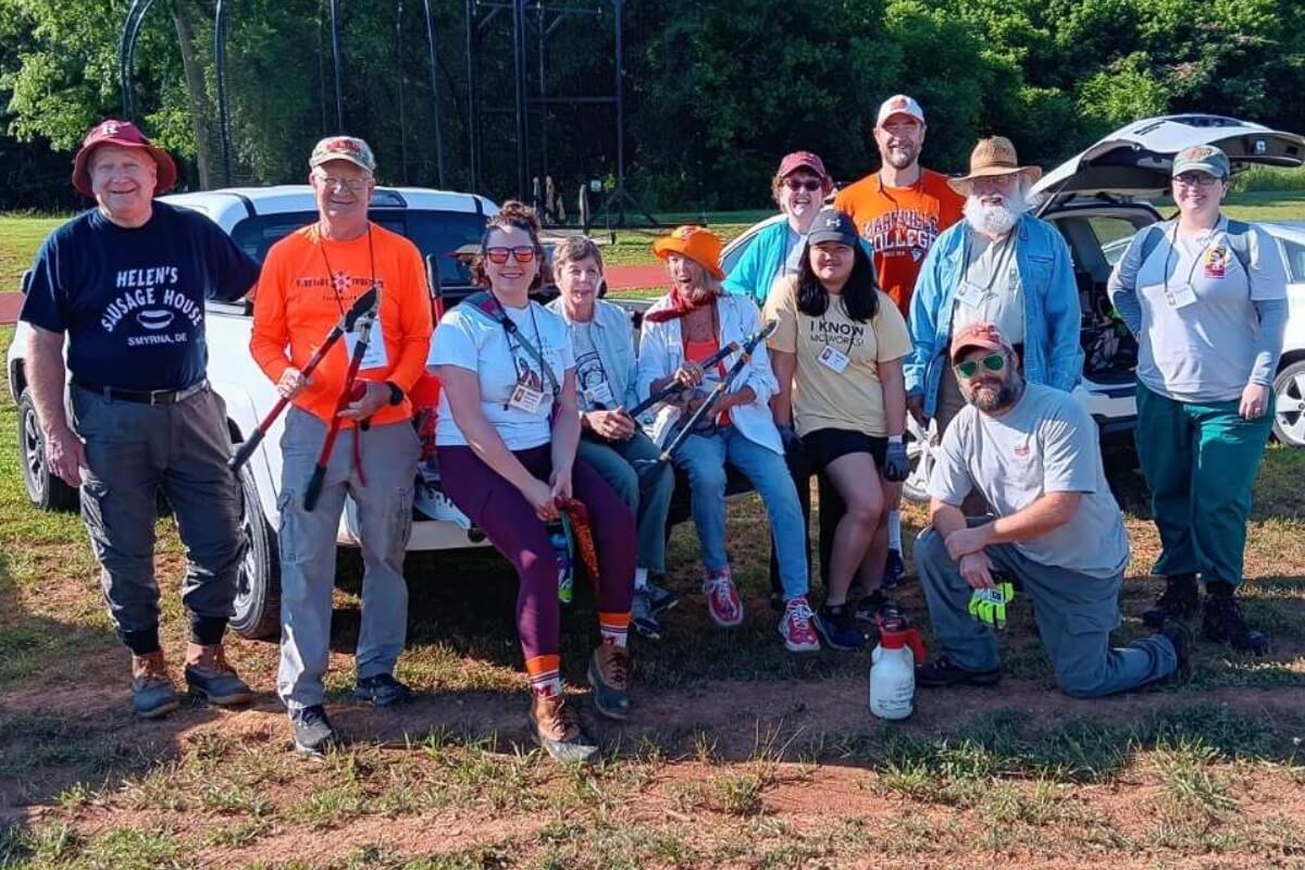 Photo of volunteers at KT Days 2024 at Maryville College, smiling and standing outside