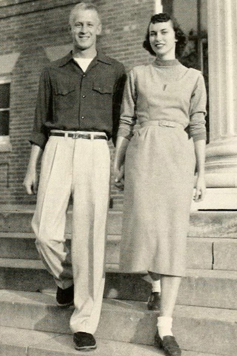 Black and white photo of a couple standing on stairs
