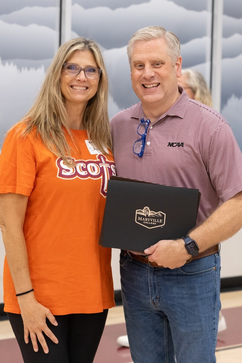 Photo of Dr. Brayn Coker with Dana Hummel