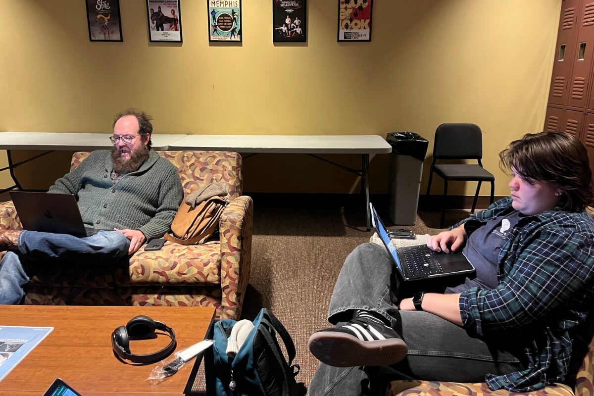 Photo of two members of the Maryville College Theatre community reading through pieces for the Nov. 21 production of "Advents"