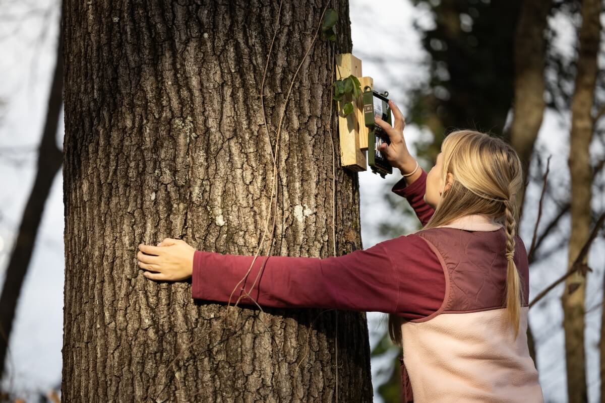 Photo of Molly Bailey opening up an echolocation recorder