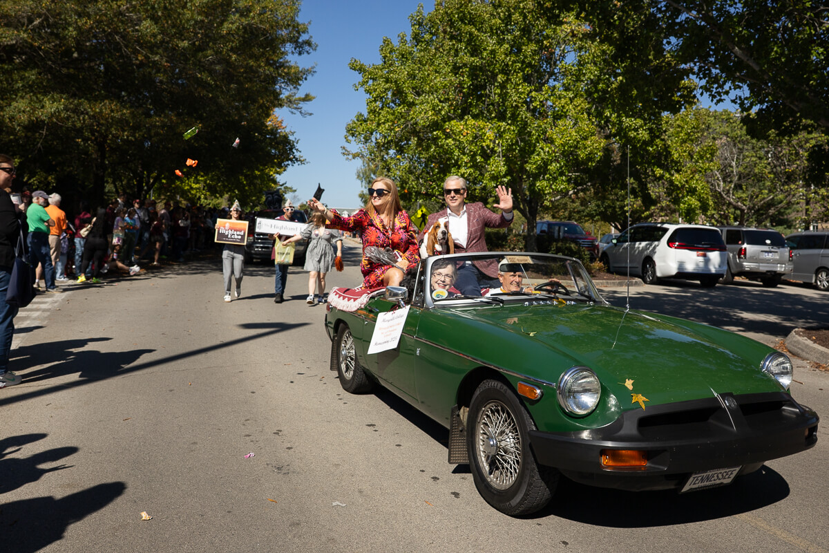 Photo of Maryville College President Dr. Bryan Coker and his wife, Sara, being chauffeured during the annual Homecoming Parade