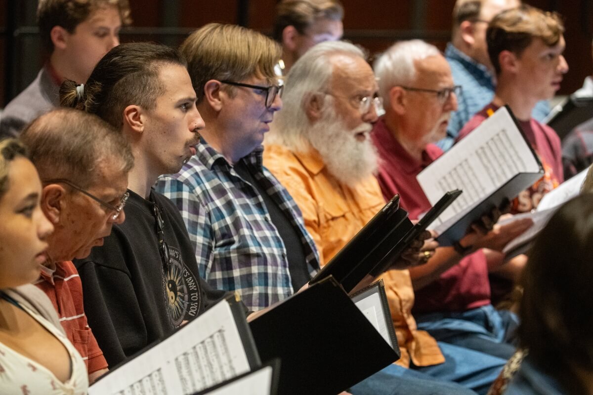 Photo of the 2024 Maryville College Homecoming Choir rehearsing for a performance.
