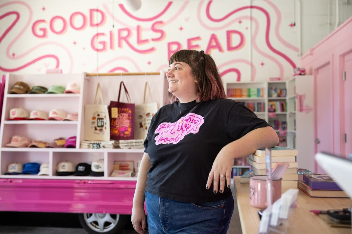 Photo of Dr. Rayanne Streeter of Maryville College inside her bookstore, Good Girl Books