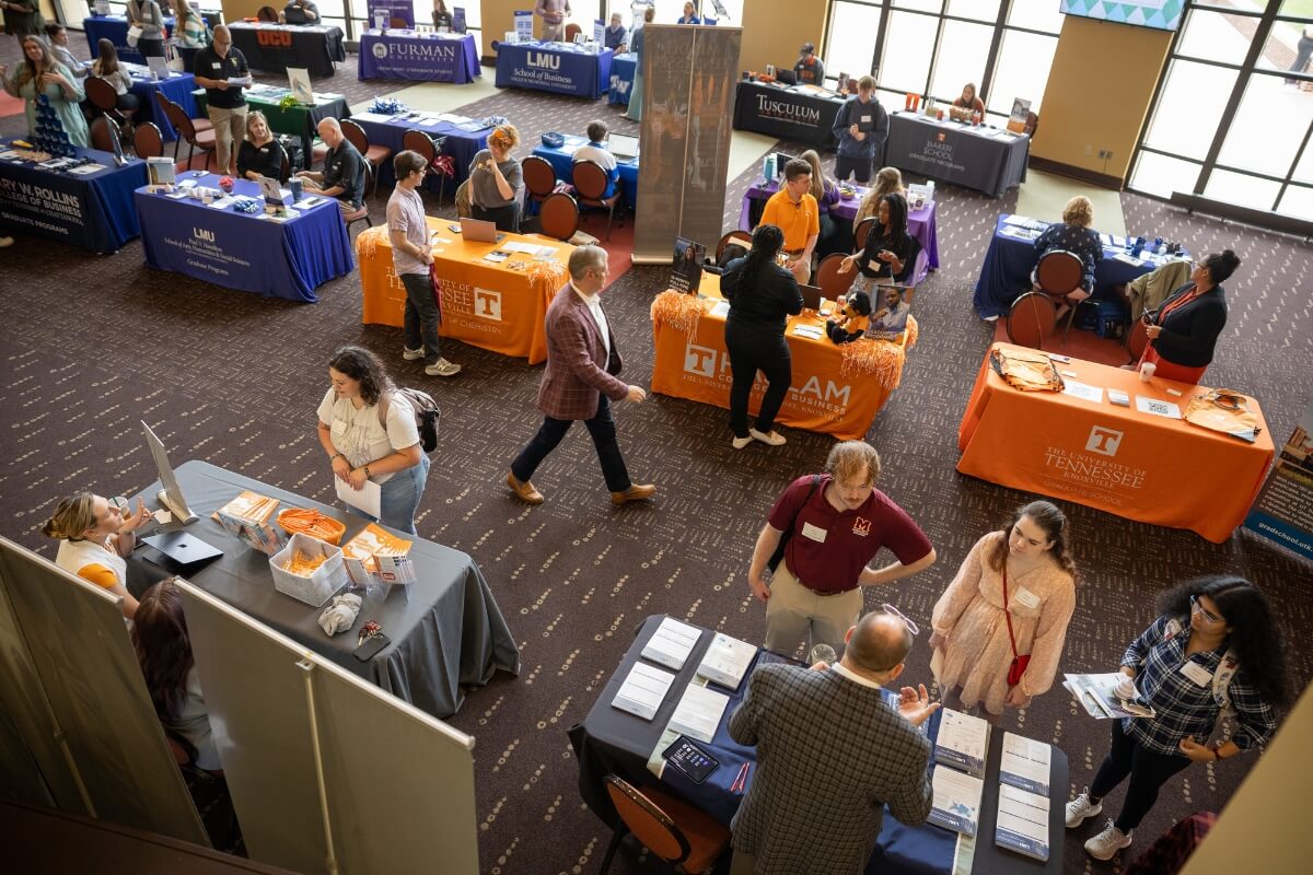 Photo of tables set up for the 2025 Graduate School and Continuing Education Fair