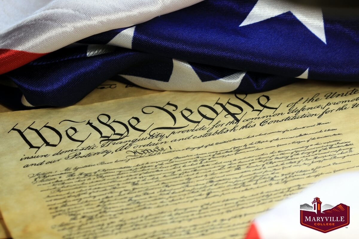 A stock photo of the Constitution draped in the American flag to commemorate Maryville College's Constitution Day observance on Sept. 17