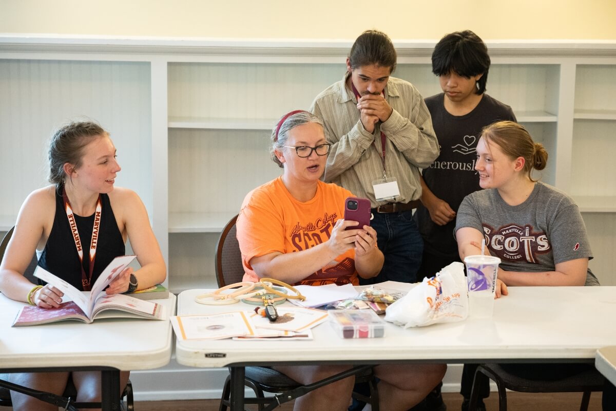 Photo of Rev. Jessica Lewis with Expanding Horizons participants at Maryville College in 2025