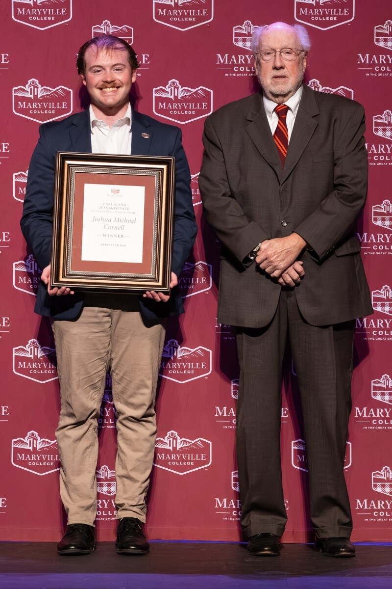 Photo of Josh Cornell with Carl McDonald