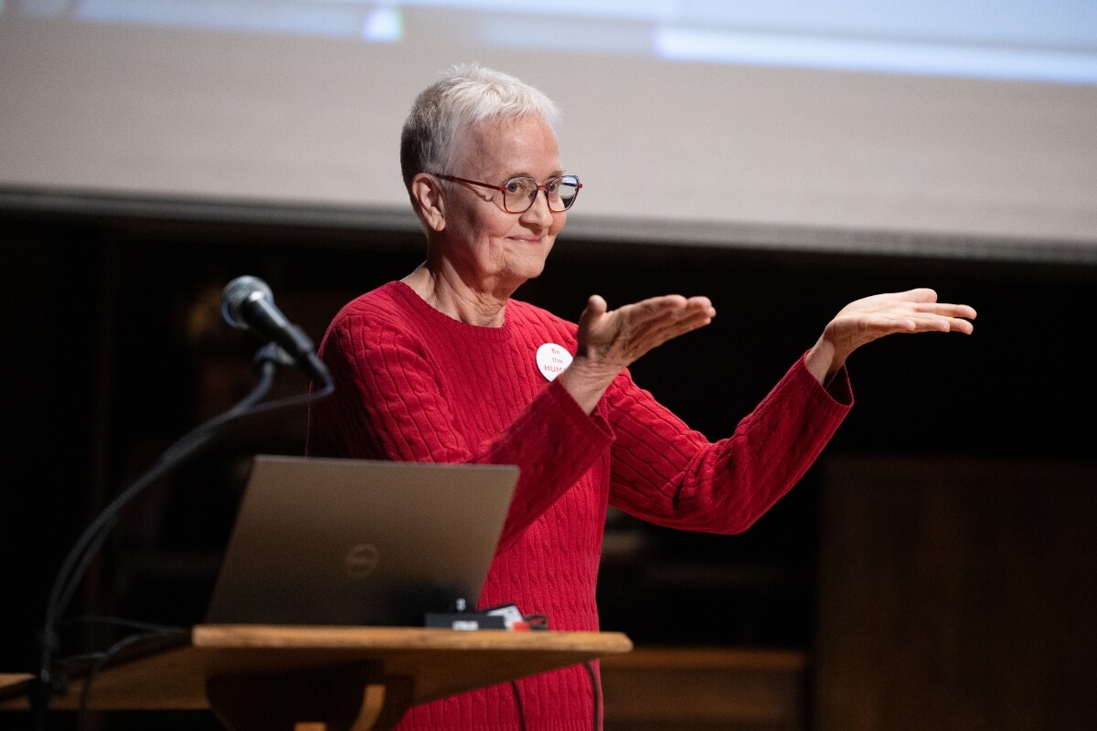 Photo of Jan Taylor gesturing with her hands