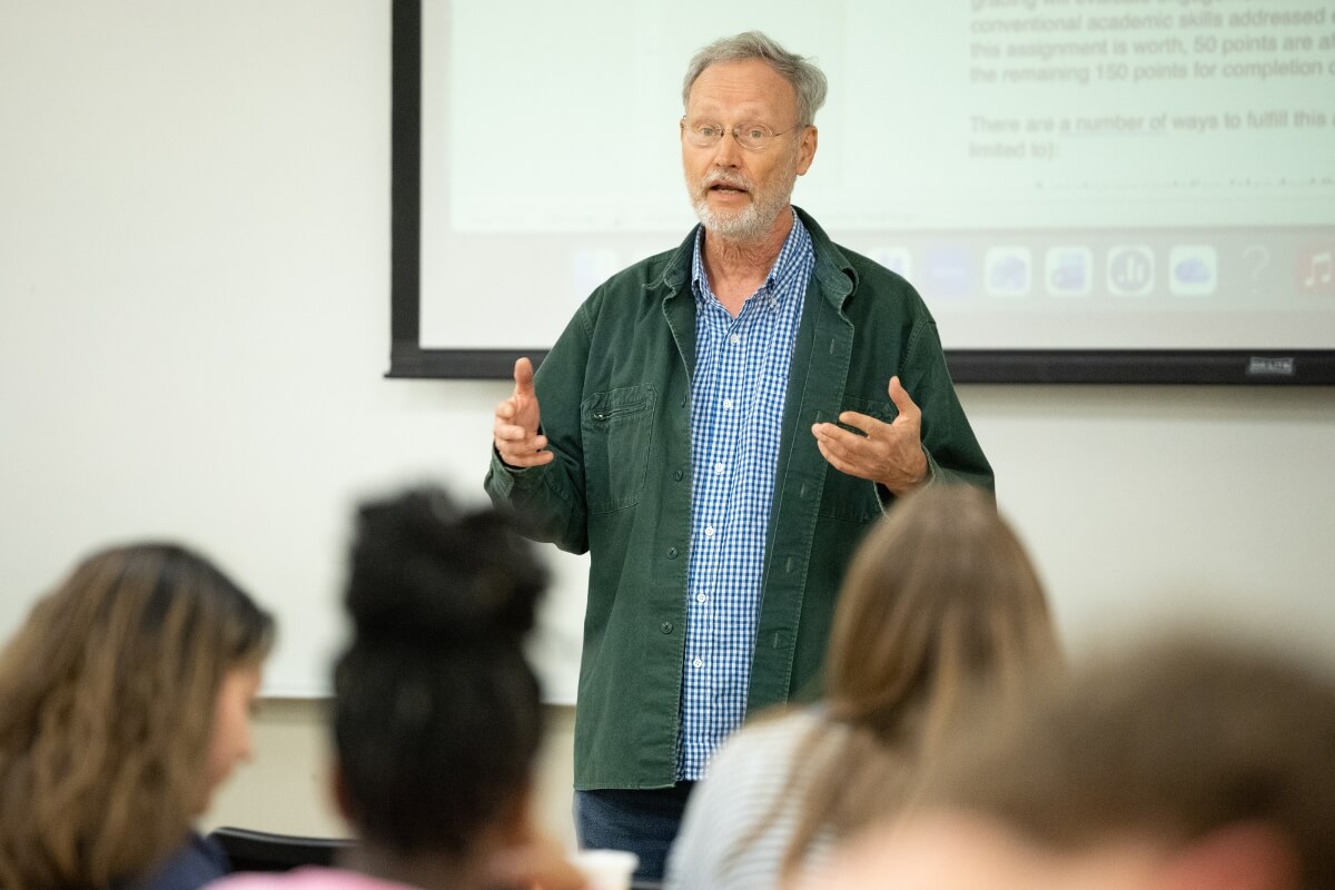 Photo of Dr. Dan Klingensmith teaching a Maryville College silent film class