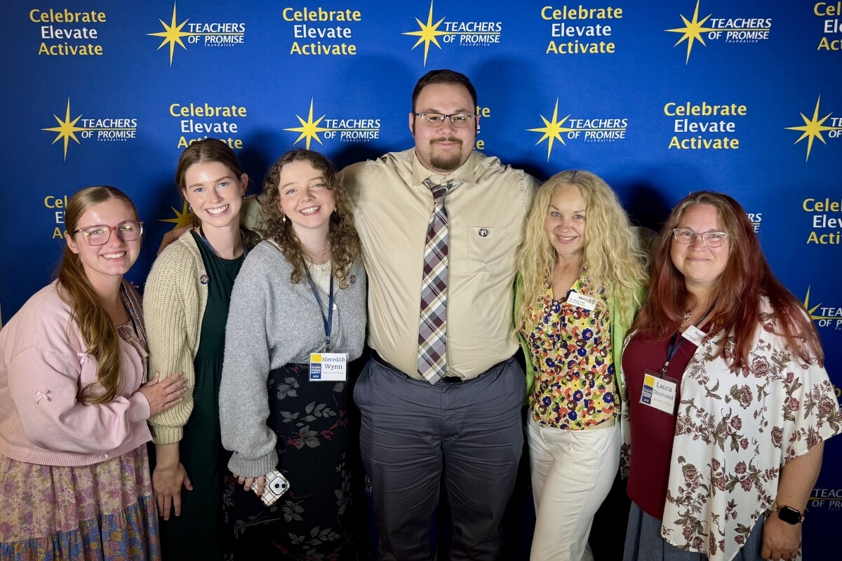 Photo of five students and a faculty advisor at the annual Smoky Mountain Teachers of Promise.