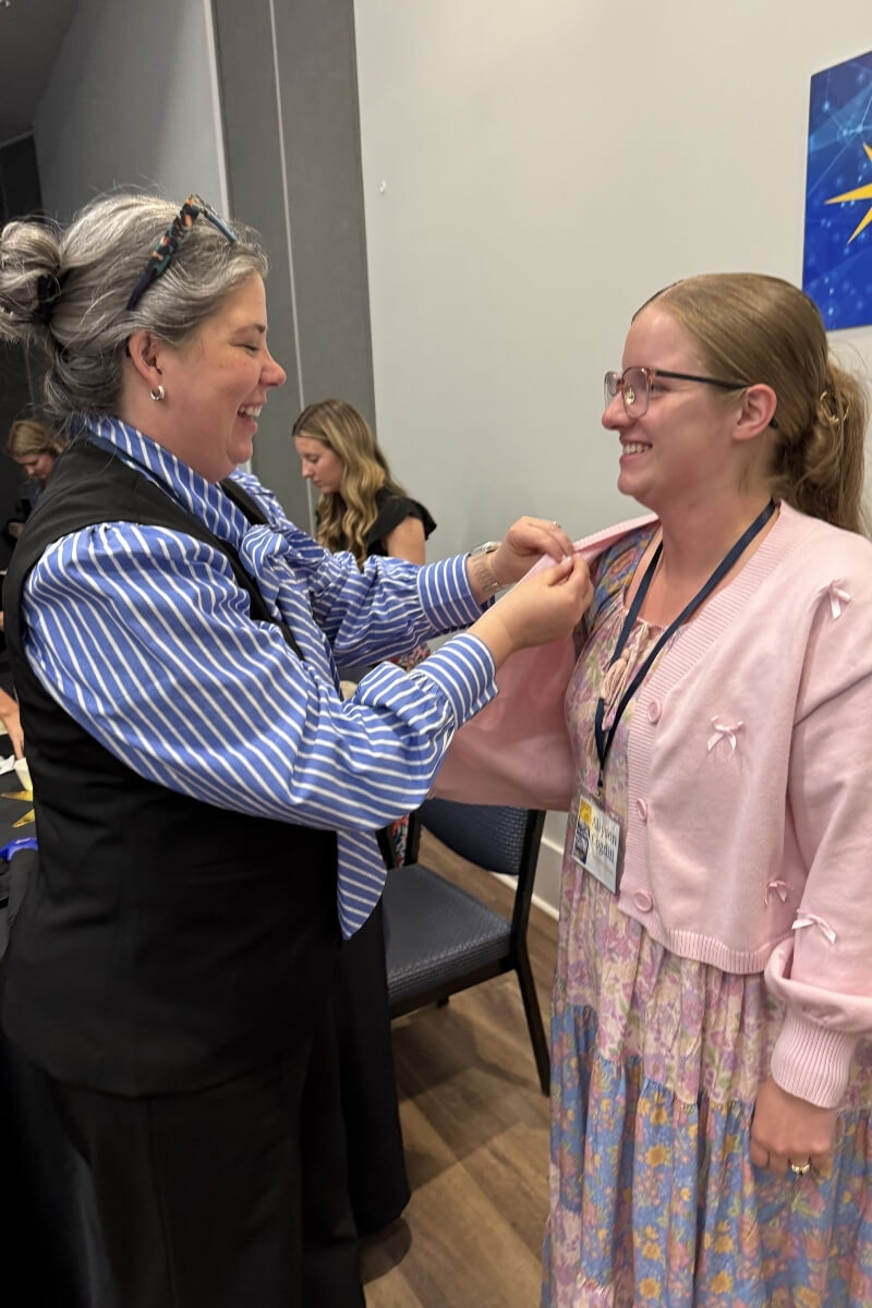 Photo of a Maryville College student being pinned at a ceremony