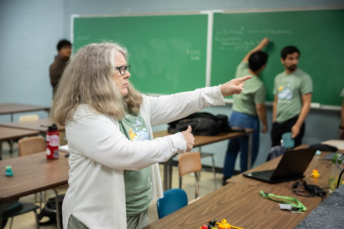 Photo of Barbara Johnson gesturing in a Maryville College classroom
