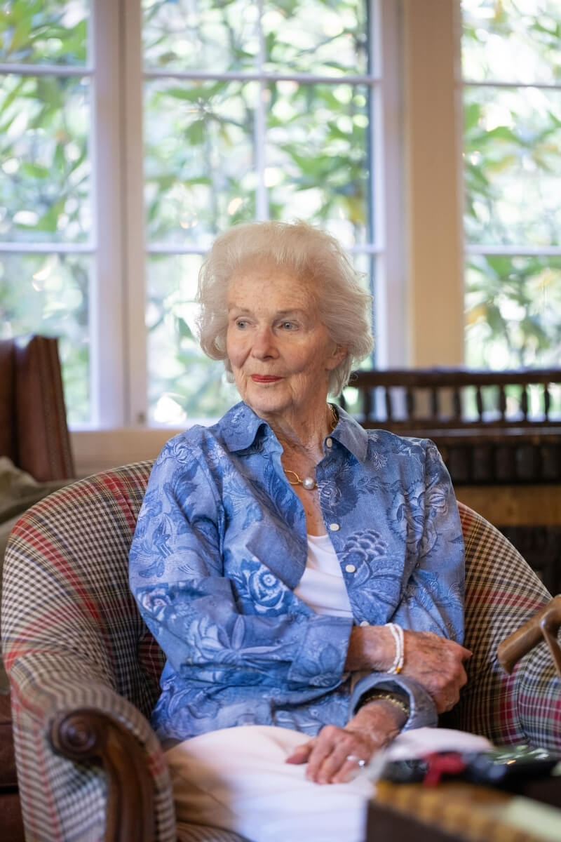 Photo of Natalie Haslam staring out the window at RT Lodge