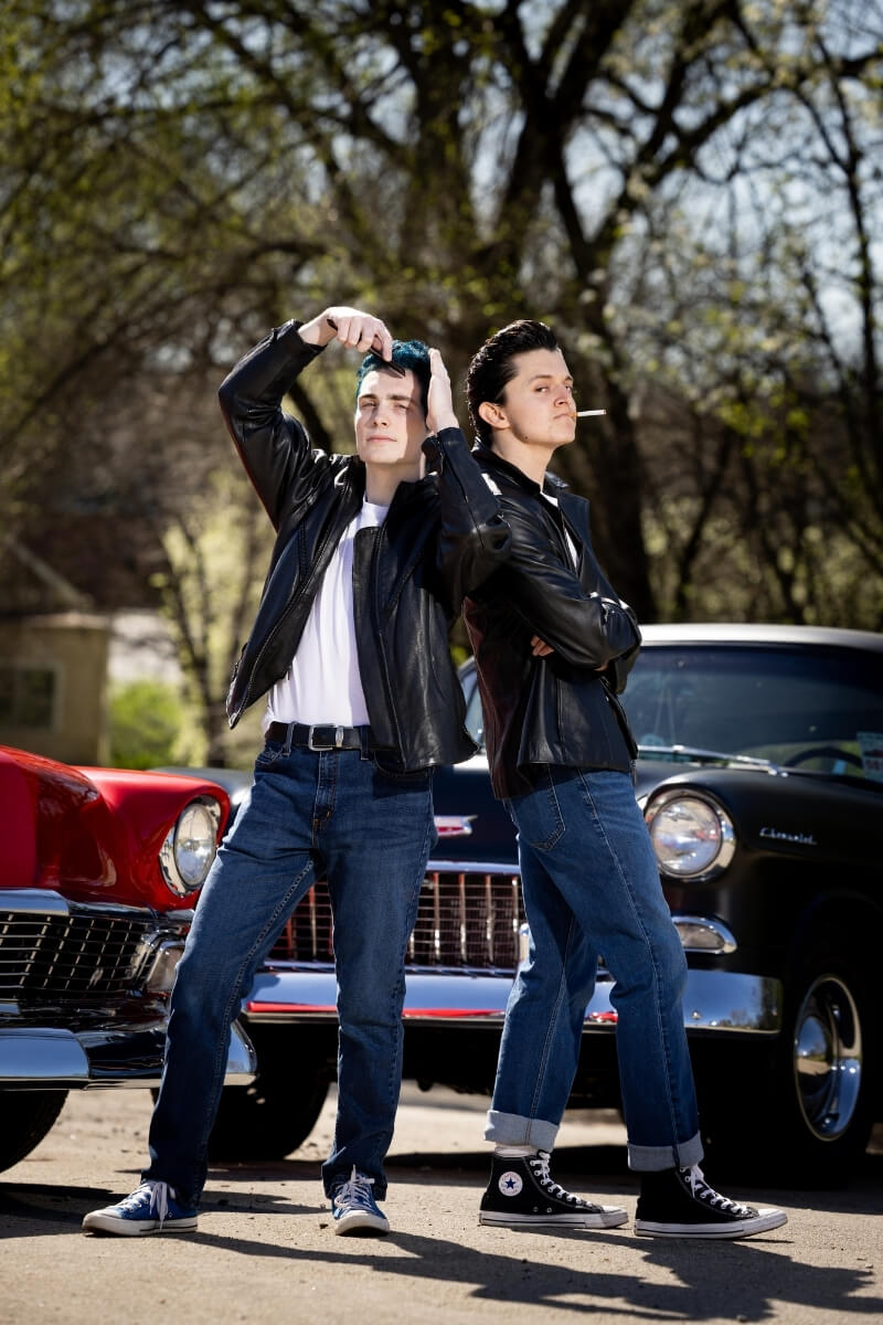 Photo of two members of the T-Birds in a photo shoot for "Grease"