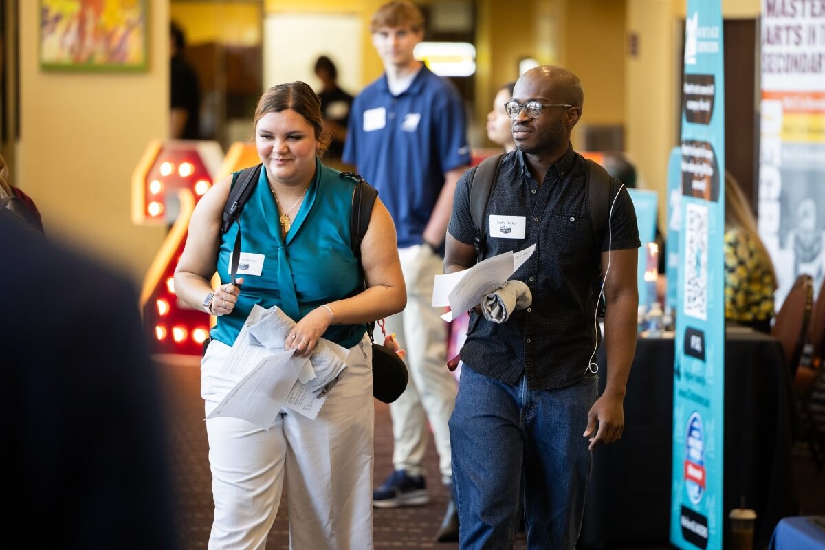 Photo of students walking into the Maryville College Spring Opportunities Fair
