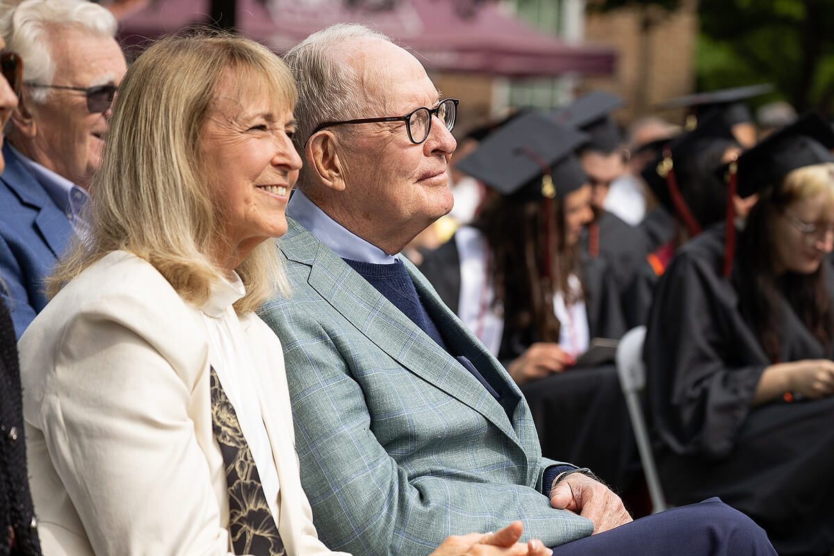 Photo of a woman and a man smiling
